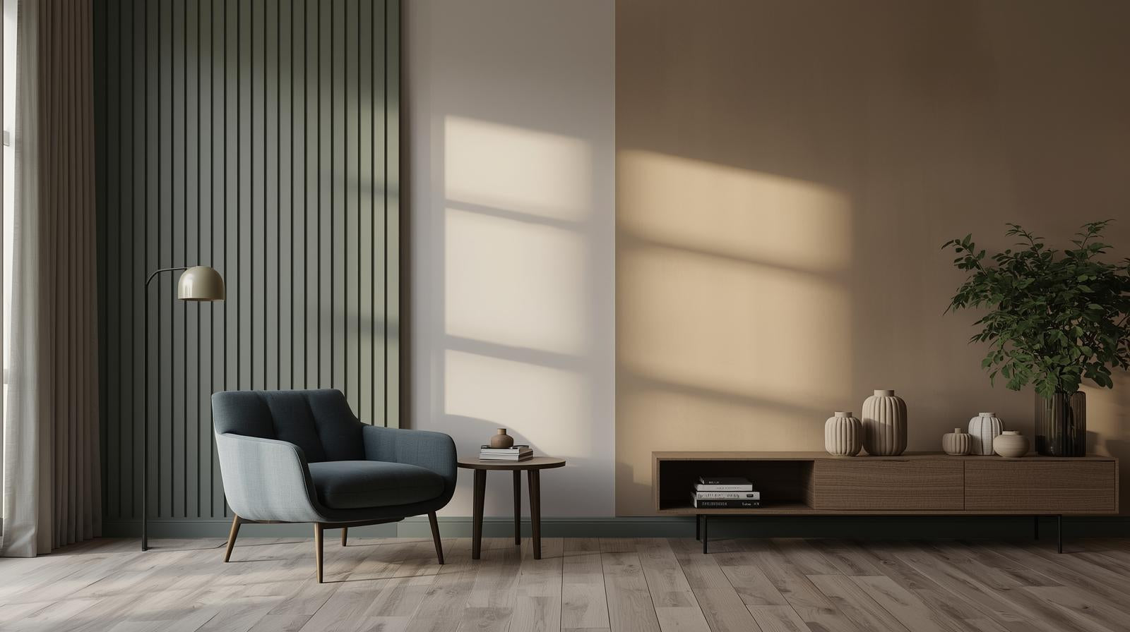 Modern living room with a gray armchair, wooden side table, and decorative items.