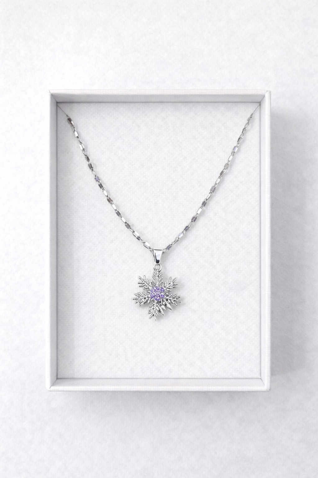 Sparkling Silver Snowflake Pendant with Amethyst Center