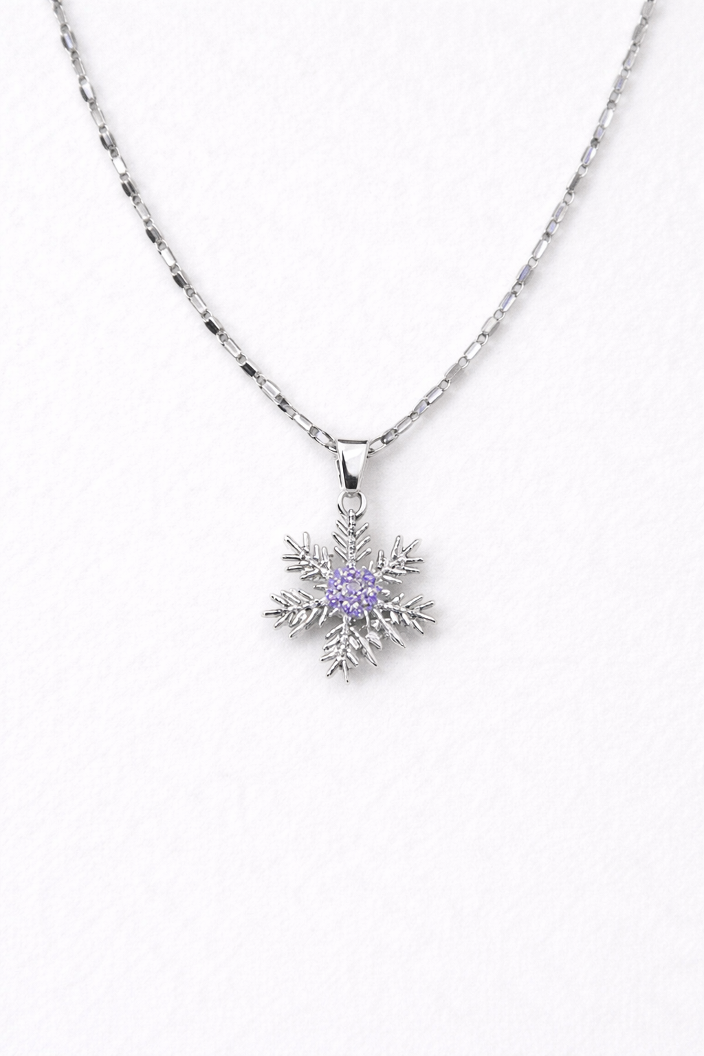 Sparkling Silver Snowflake Pendant with Amethyst Center