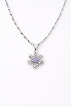 Sparkling Silver Snowflake Pendant with Amethyst Center