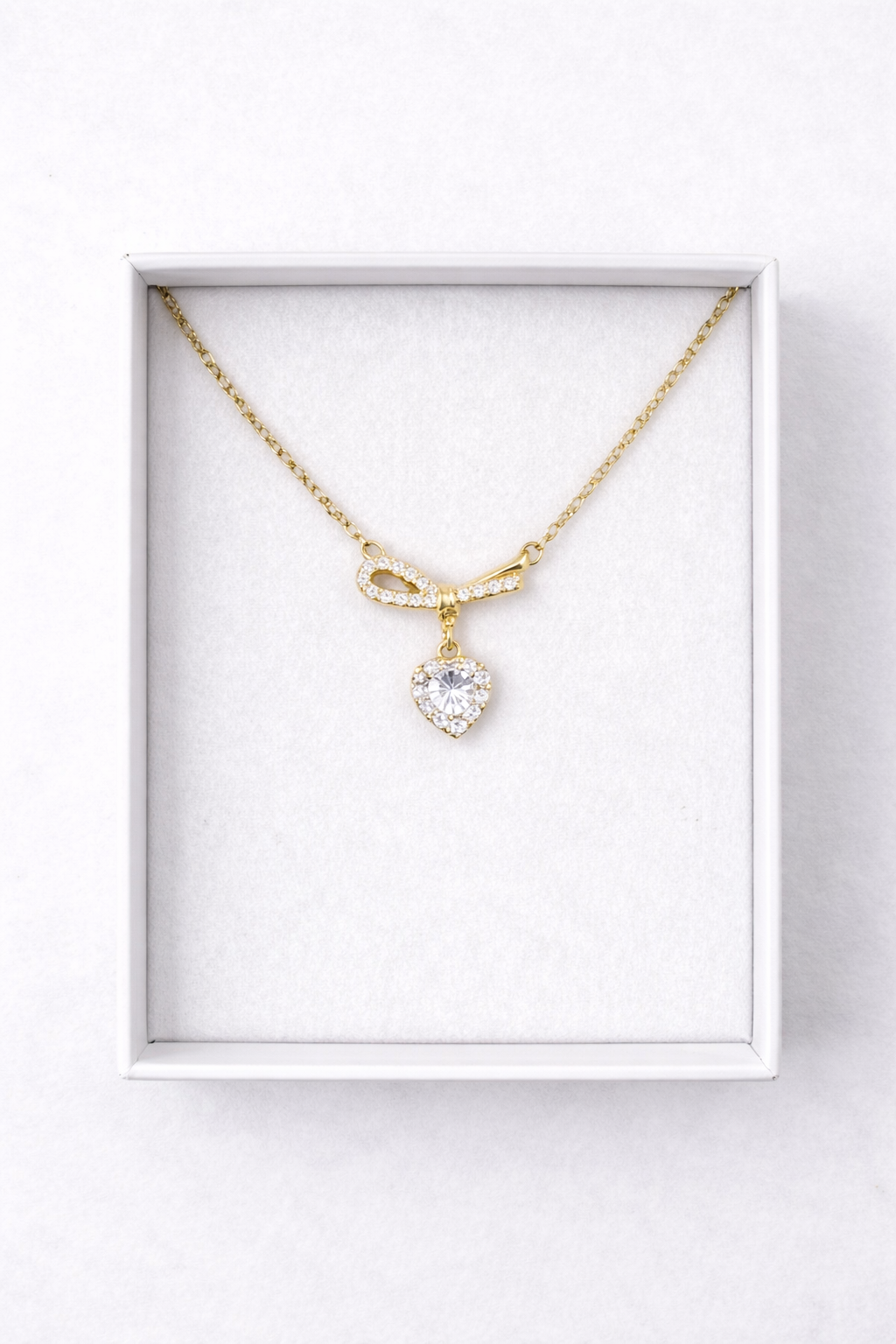 Gold Ribbon Bow Necklace with Dainty Heart Drop