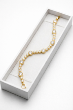 Bezel-Set Graduated Crystal Gold Tennis Bracelet