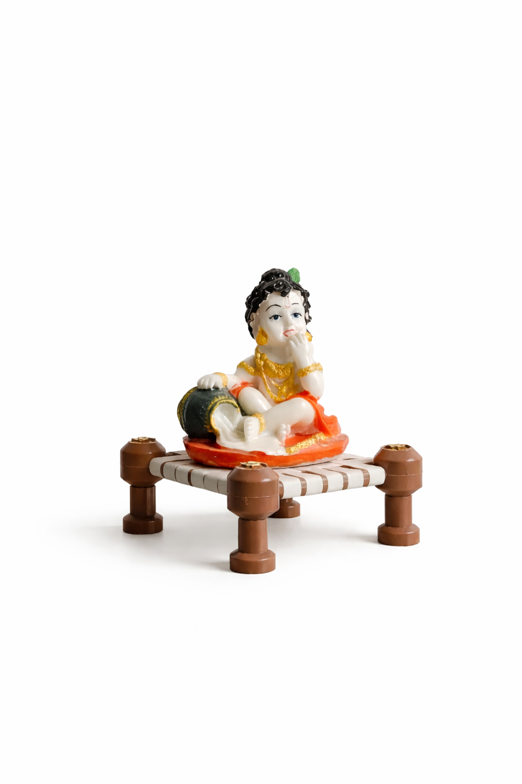 Little Krishna Eating Butter on Charpai – Handcrafted Polyresin Janmashtami Decor