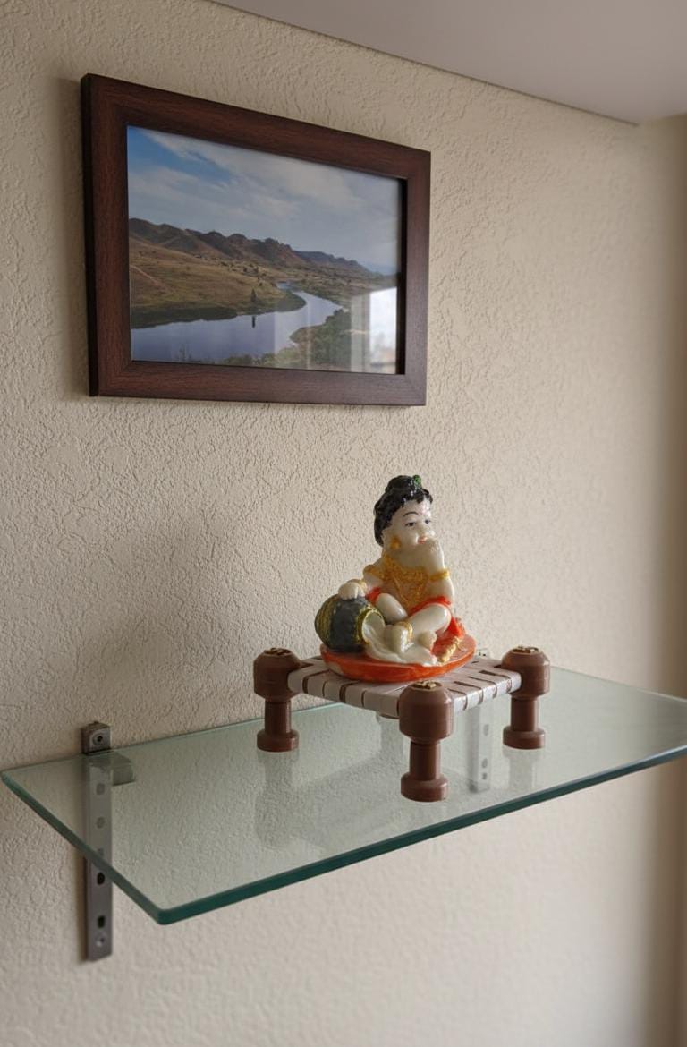 Little Krishna Eating Butter on Charpai – Handcrafted Polyresin Janmashtami Decor